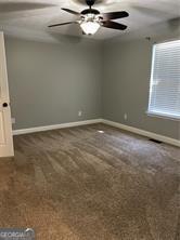 370 Rainey Dr, Dawsonville, GA 30534 - spare room with baseboards, carpet flooring, and ceiling fan