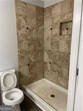 370 Rainey Dr, Dawsonville, GA 30534 - bathroom featuring a shower stall and toilet