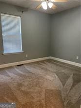 370 Rainey Dr, Dawsonville, GA 30534 - carpeted spare room featuring baseboards, visible vents, and ceiling fan