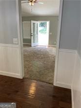 370 Rainey Dr, Dawsonville, GA 30534 - hall featuring wood finished floors and wainscoting