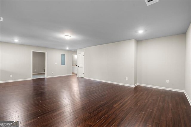 5726 Ridgewater Cir, Gainesville, GA 30506 - empty room with dark wood finished floors, baseboards, and electric panel
