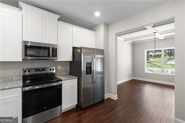 5726 Ridgewater Cir, Gainesville, GA 30506 - kitchen featuring dark wood-type flooring, white cabinets, a chandelier, and appliances with stainless steel finishes