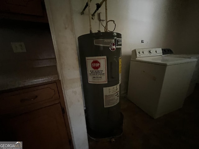 utility room featuring water heater and washer / clothes dryer