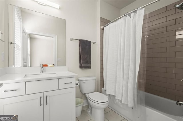 full bath featuring tile patterned floors, toilet, shower / bath combo, and vanity