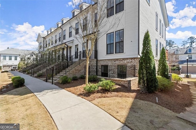 view of property with a residential view