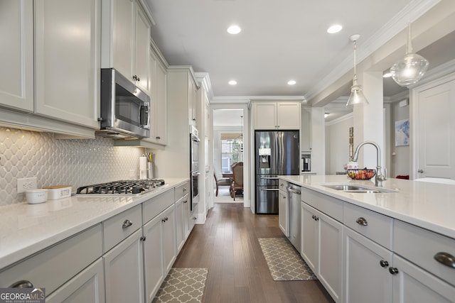 11395 Crestview Ter, Johns Creek, GA 30024 - kitchen featuring stainless steel appliances, a sink, ornamental molding, tasteful backsplash, and recessed lighting