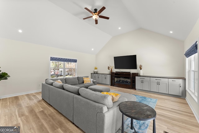 385 Jayne Ellen Way, Alpharetta, GA 30009 - living room featuring lofted ceiling, a ceiling fan, light wood-style floors, recessed lighting, and baseboards
