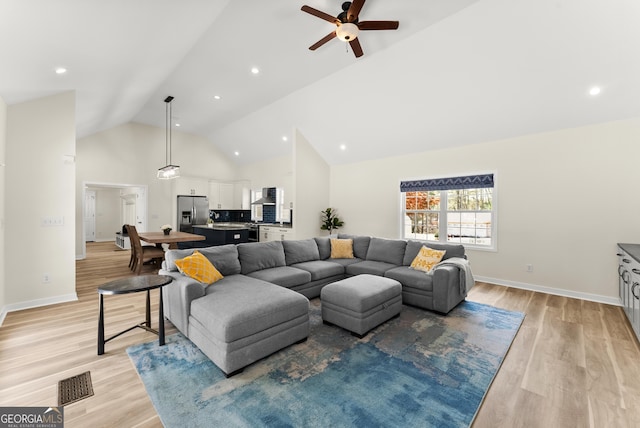 385 Jayne Ellen Way, Alpharetta, GA 30009 - living area featuring a ceiling fan, light wood-style floors, high vaulted ceiling, baseboards, and recessed lighting