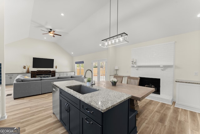 385 Jayne Ellen Way, Alpharetta, GA 30009 - kitchen with a sink, open floor plan, ceiling fan, stainless steel dishwasher, and lofted ceiling