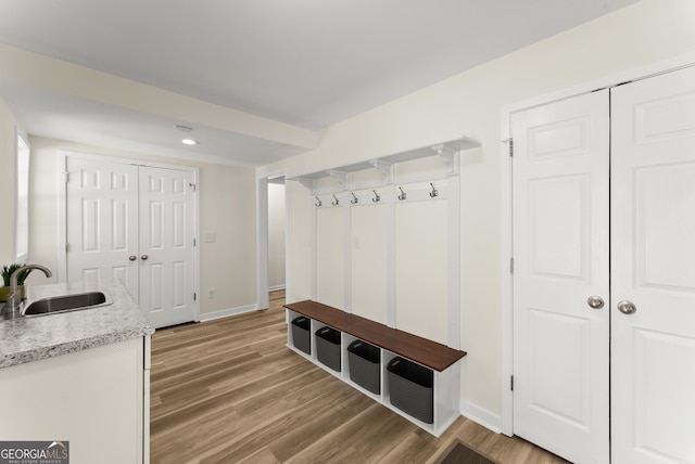 385 Jayne Ellen Way, Alpharetta, GA 30009 - mudroom featuring a sink, light wood finished floors, baseboards, and recessed lighting