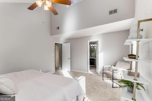 4519 Glenforest Dr NE, Roswell, GA 30075 - bedroom with a high ceiling, baseboards, visible vents, and light colored carpet