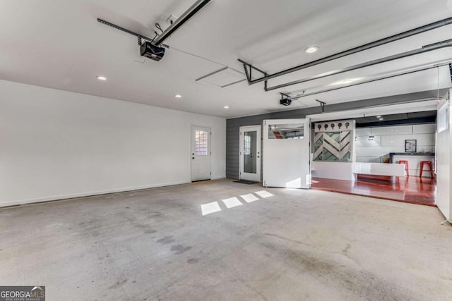 4519 Glenforest Dr NE, Roswell, GA 30075 - garage with recessed lighting and a garage door opener