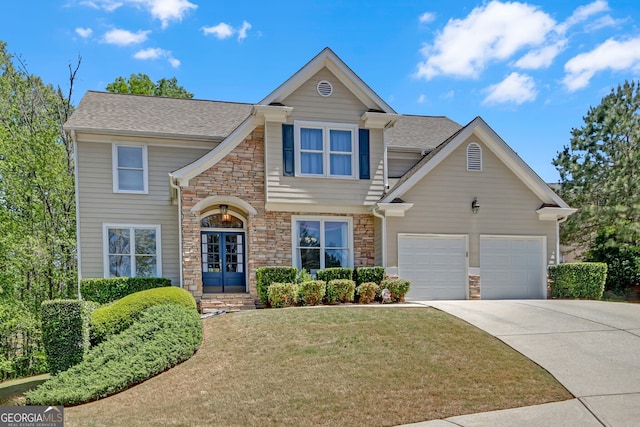 1210 Spring Branch Ct, Lawrenceville, GA 30045 - view of front of home with stone siding, concrete driveway, a front yard, and an attached garage