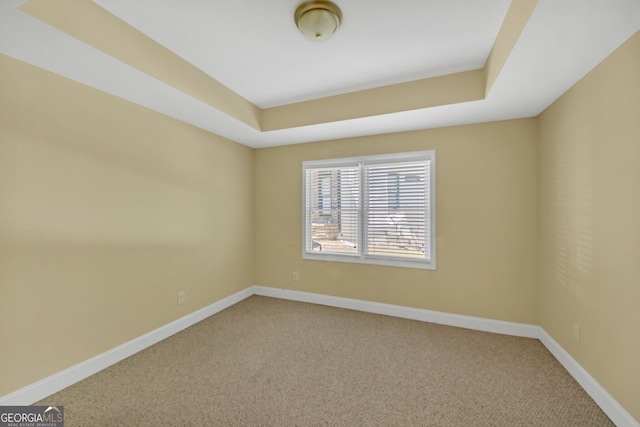 1210 Spring Branch Ct, Lawrenceville, GA 30045 - carpeted spare room featuring a tray ceiling