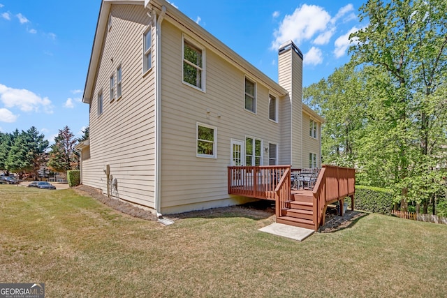 1210 Spring Branch Ct, Lawrenceville, GA 30045 - back of house featuring a wooden deck, a chimney, and a yard