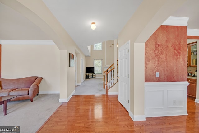 1210 Spring Branch Ct, Lawrenceville, GA 30045 - hall featuring light wood-type flooring, stairway, and arched walkways