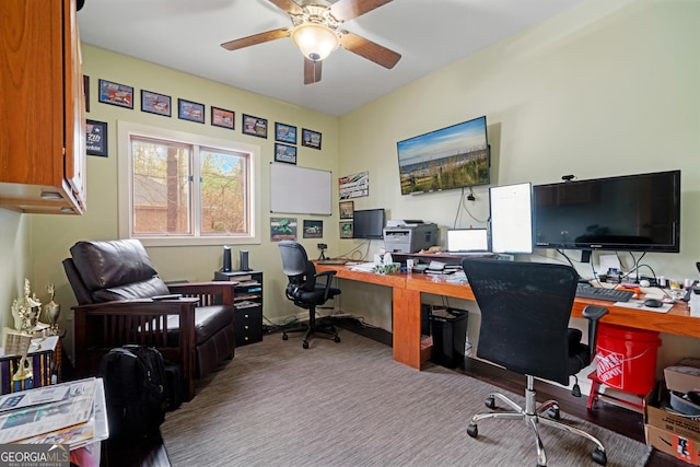 office space featuring carpet floors and ceiling fan