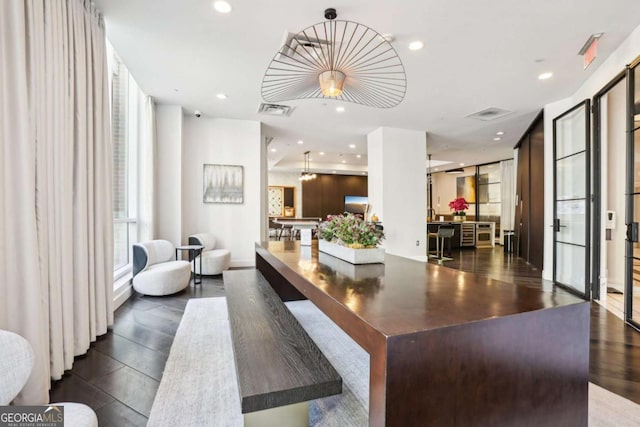 building lobby featuring visible vents