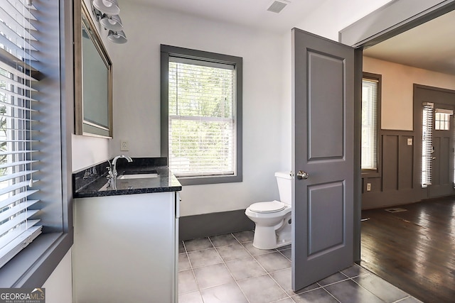 1497 Rogers Ave SW, Atlanta, GA 30310 - half bath with toilet, tile patterned flooring, and vanity