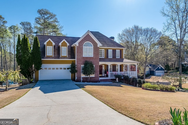 5045 Southern Trace Dr, Gainesville, GA 30504 - view of front of house with a porch, an attached garage, a front yard, and driveway