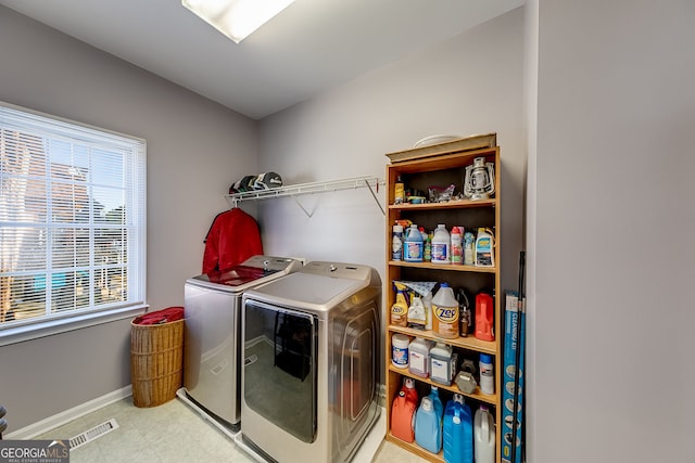 5045 Southern Trace Dr, Gainesville, GA 30504 - washroom featuring washing machine and clothes dryer, baseboards, and light floors