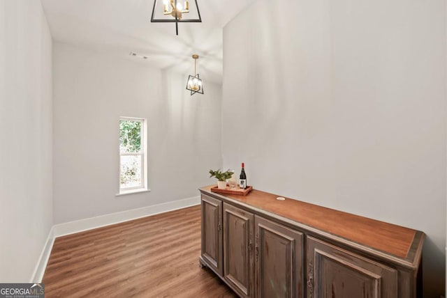 112 E Fambrough St, Monroe, GA 30655 - kitchen featuring a sink, white cabinetry, backsplash, light stone countertops, and stainless steel electric stove