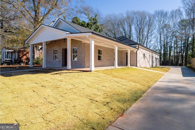 112 E Fambrough St, Monroe, GA 30655 - view of front of home featuring brick siding, a porch, concrete driveway, and a shingled roof