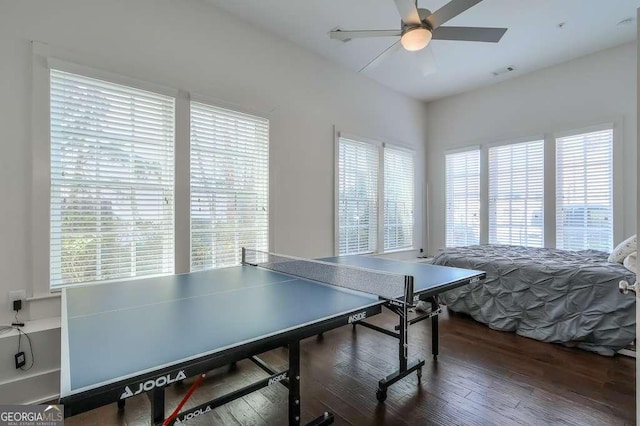 game room featuring visible vents, wood finished floors, and a ceiling fan