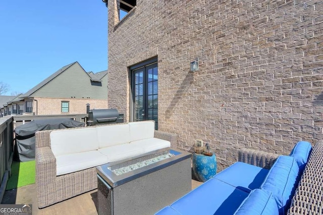 view of patio / terrace featuring outdoor lounge area and area for grilling