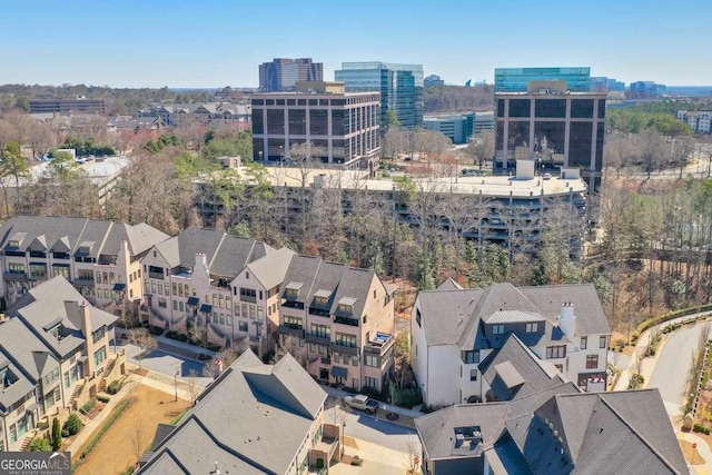 birds eye view of property with a city view