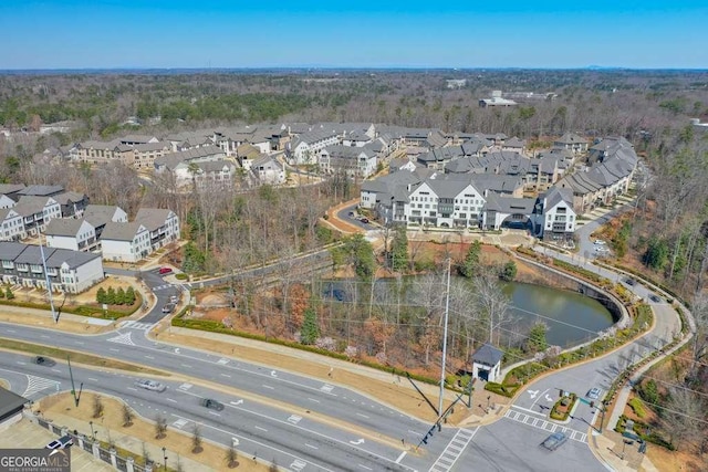 aerial view with a residential view and a water view