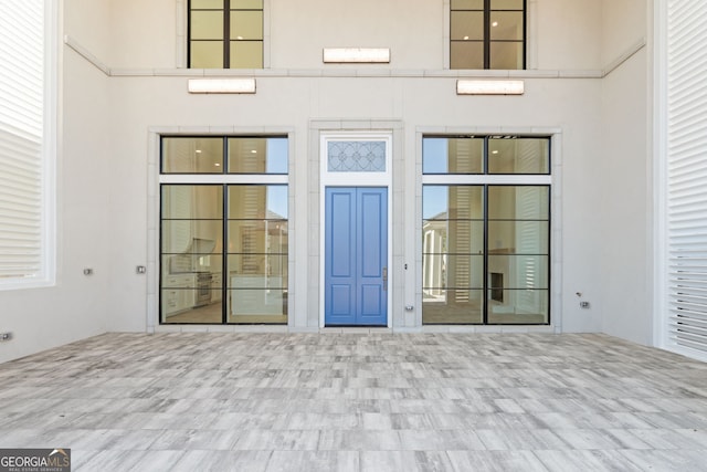 doorway to property with a patio