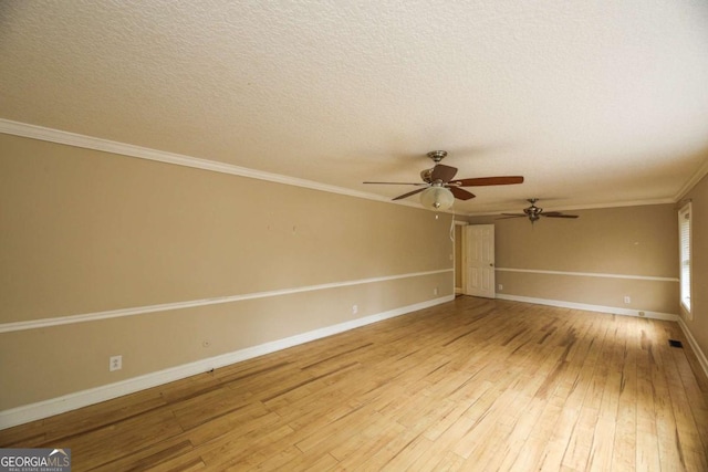 1100 Atlantic Ave, Waycross, GA 31501 - empty room with light wood-style floors, ceiling fan, crown molding, and a textured ceiling