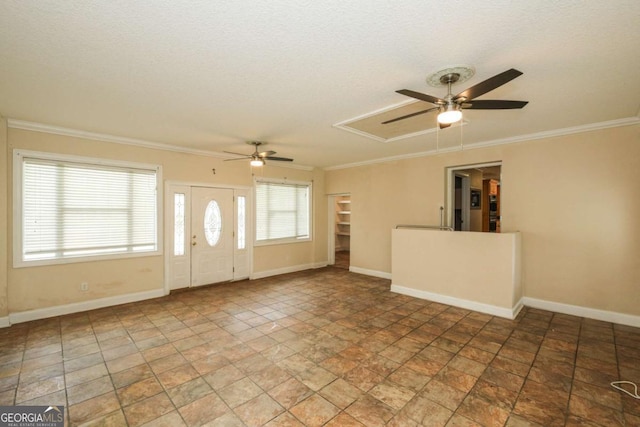 1100 Atlantic Ave, Waycross, GA 31501 - unfurnished living room with a ceiling fan, stone finish floors, attic access, and ornamental molding