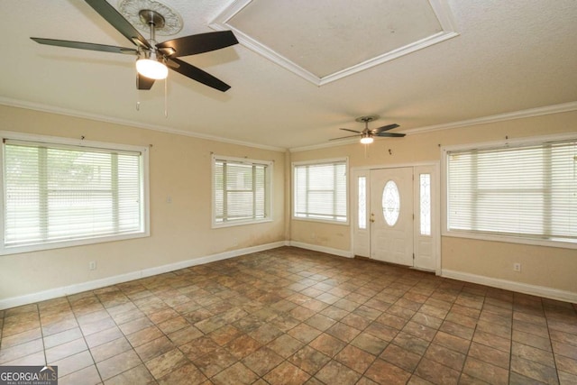 1100 Atlantic Ave, Waycross, GA 31501 - foyer entrance with ceiling fan, healthy amount of natural light, stone finish flooring, and crown molding
