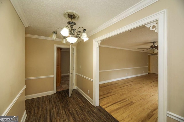 1100 Atlantic Ave, Waycross, GA 31501 - unfurnished room with wood finished floors, a chandelier, a textured ceiling, and a ceiling fan