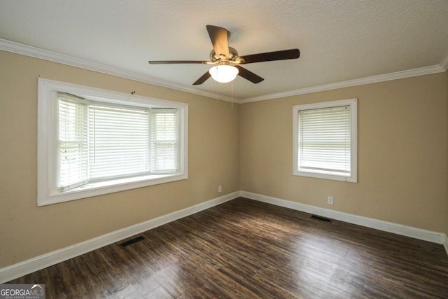 1100 Atlantic Ave, Waycross, GA 31501 - spare room with dark wood-style floors, ornamental molding, and a ceiling fan