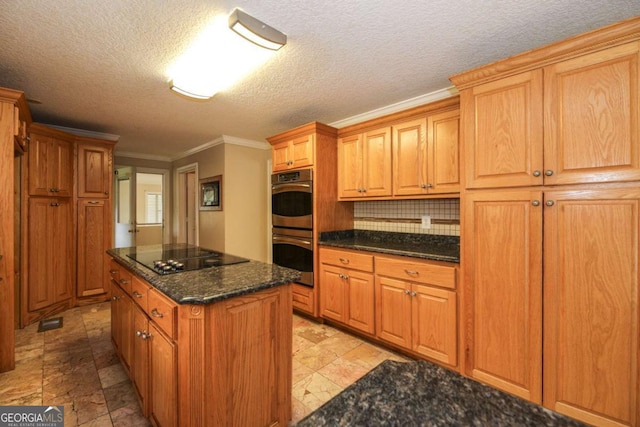 1100 Atlantic Ave, Waycross, GA 31501 - kitchen with black electric cooktop, double oven, crown molding, a center island, and a textured ceiling