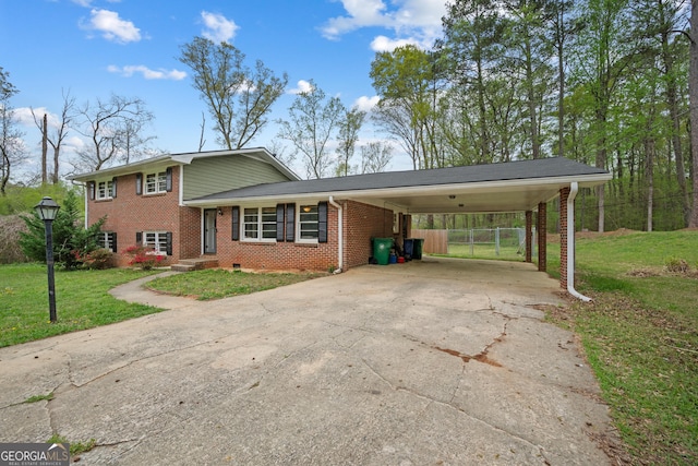 4329 Cedar Valley Ln, Conley, GA 30288 - split level home with driveway, brick siding, and a carport