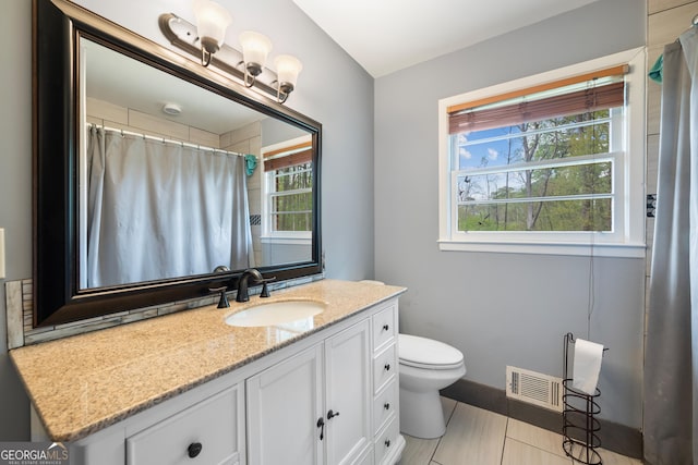 4329 Cedar Valley Ln, Conley, GA 30288 - full bath featuring healthy amount of natural light, vanity, and a shower with curtain