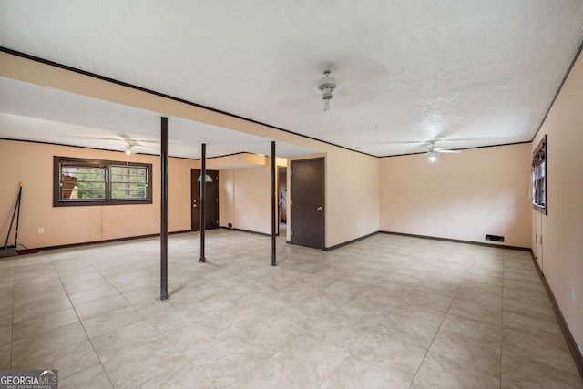 4329 Cedar Valley Ln, Conley, GA 30288 - below grade area with ceiling fan and a textured ceiling