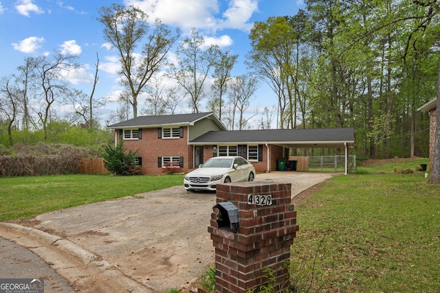 4329 Cedar Valley Ln, Conley, GA 30288 - split level home featuring driveway, brick siding, and a carport