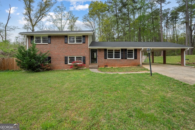 4329 Cedar Valley Ln, Conley, GA 30288 - tri-level home with concrete driveway, brick siding, and an attached carport