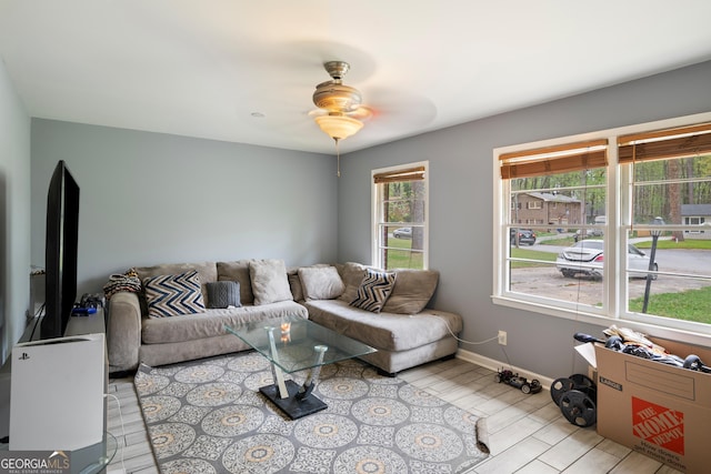 4329 Cedar Valley Ln, Conley, GA 30288 - living area with ceiling fan and wood tiled floors