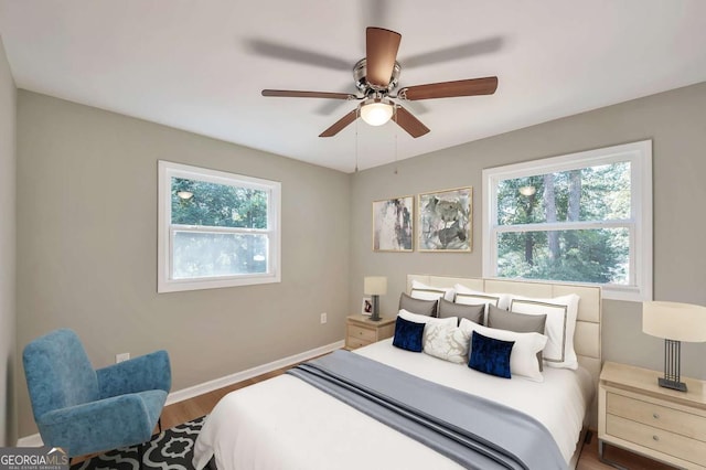 3650 Clovis Ct NW, Atlanta, GA 30331 - bedroom with a ceiling fan, baseboards, and wood finished floors