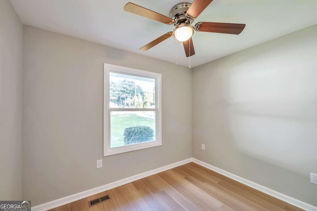 3650 Clovis Ct NW, Atlanta, GA 30331 - spare room with baseboards, visible vents, wood finished floors, and a ceiling fan
