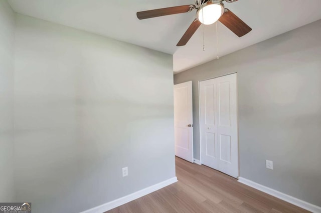 3650 Clovis Ct NW, Atlanta, GA 30331 - unfurnished room with baseboards, wood finished floors, and a ceiling fan