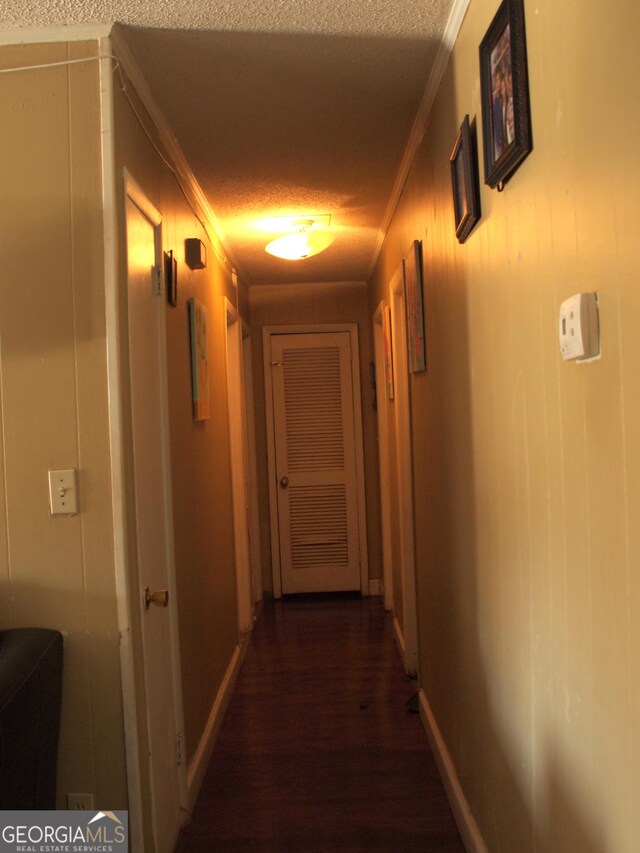 124 Dublin Way, Dalton, GA 30720 - hallway with dark wood-style floors, crown molding, and a textured ceiling