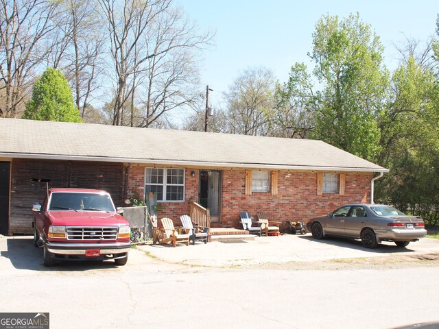 124 Dublin Way, Dalton, GA 30720 - ranch-style home with driveway and brick siding