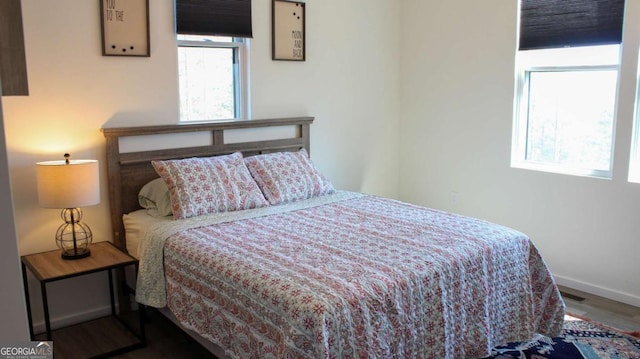 201 Huntington Pl, Dahlonega, GA 30533 - bedroom featuring baseboards and wood finished floors